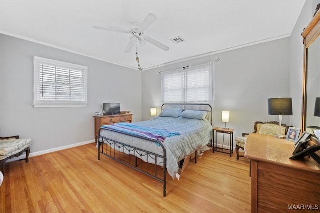901 Green Forest Dr, Montgomery, AL 36109 - bedroom featuring multiple windows, light wood-style floors, crown molding, and a ceiling fan