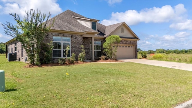 8326 Sunrise Loop, Montgomery, AL 36116 - view of front of home featuring brick siding, concrete driveway, a garage, a shingled roof, and a front yard