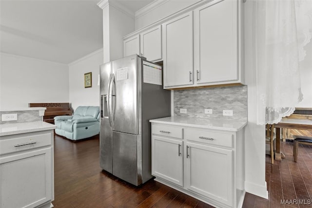 8326 Sunrise Loop, Montgomery, AL 36116 - kitchen featuring ornamental molding, stainless steel fridge with ice dispenser, dark wood-type flooring, open floor plan, and tasteful backsplash