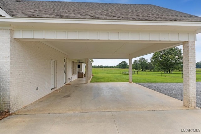 493 Lake Ridge Rd, Hope Hull, AL 36043 - view of patio featuring an attached carport and driveway