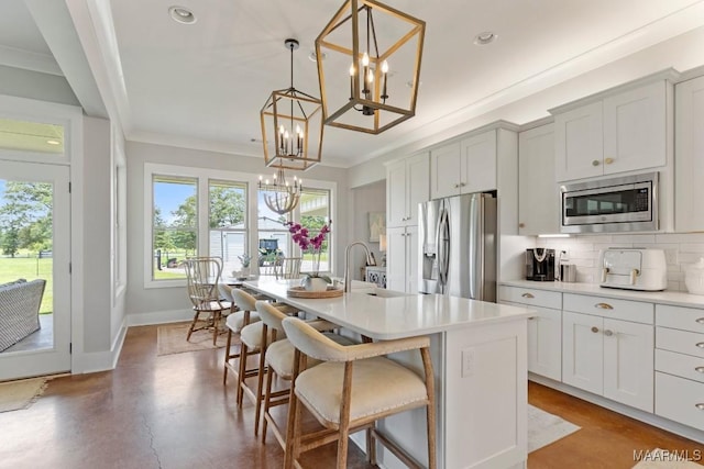 493 Lake Ridge Rd, Hope Hull, AL 36043 - kitchen featuring appliances with stainless steel finishes, a chandelier, backsplash, recessed lighting, and light countertops