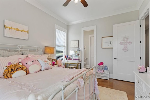 493 Lake Ridge Rd, Hope Hull, AL 36043 - bedroom with connected bathroom, crown molding, ceiling fan, and dark wood-type flooring