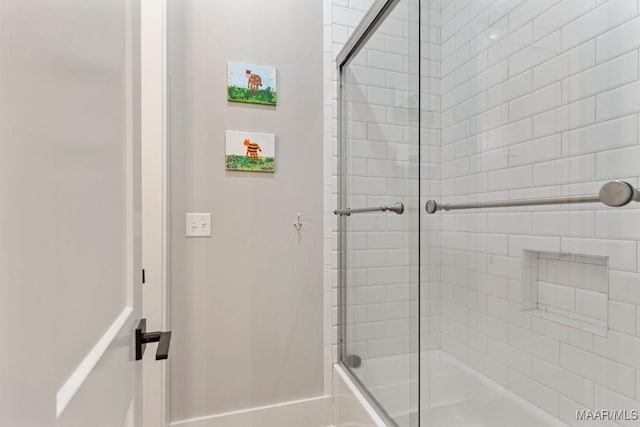 493 Lake Ridge Rd, Hope Hull, AL 36043 - bathroom with combined bath / shower with glass door