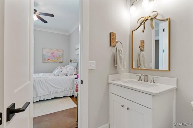 493 Lake Ridge Rd, Hope Hull, AL 36043 - bathroom with ornamental molding, vanity, ceiling fan, and ensuite bathroom