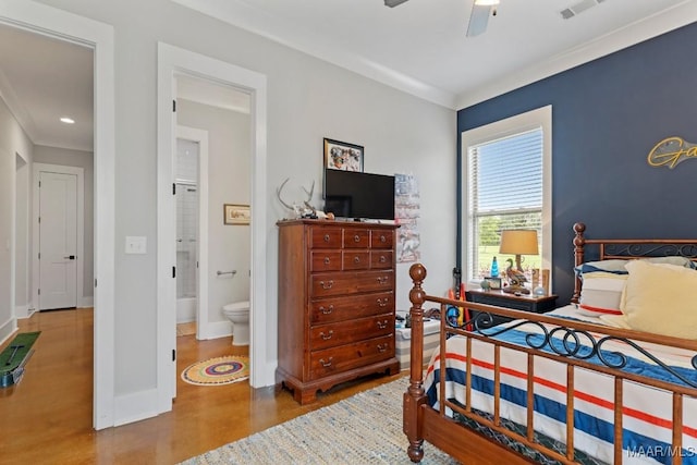 493 Lake Ridge Rd, Hope Hull, AL 36043 - bedroom with ornamental molding, finished concrete floors, ensuite bath, and a ceiling fan