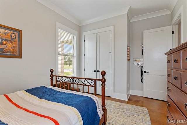 493 Lake Ridge Rd, Hope Hull, AL 36043 - bedroom featuring finished concrete floors, a closet, and crown molding