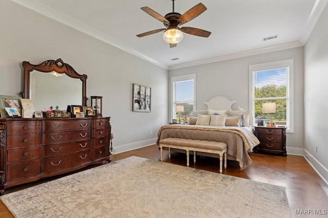 493 Lake Ridge Rd, Hope Hull, AL 36043 - bedroom featuring multiple windows, crown molding, ceiling fan, and wood finished floors