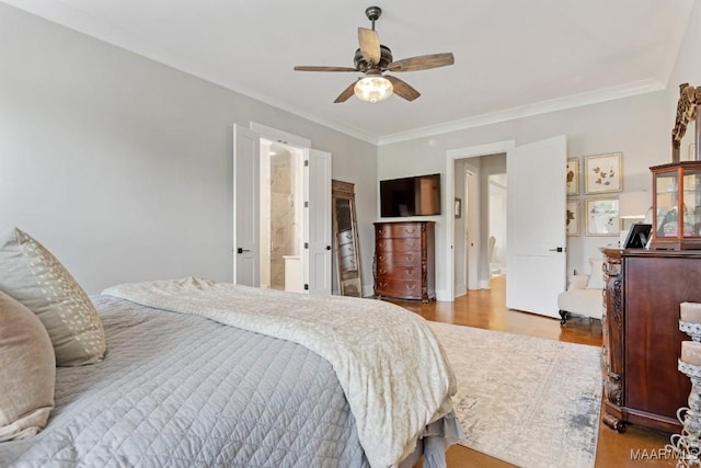 493 Lake Ridge Rd, Hope Hull, AL 36043 - bedroom featuring wood finished floors, crown molding, and a ceiling fan