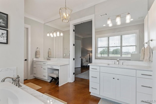 493 Lake Ridge Rd, Hope Hull, AL 36043 - bathroom with two vanities, a chandelier, a tub, ornamental molding, and connected bathroom