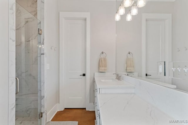 493 Lake Ridge Rd, Hope Hull, AL 36043 - bathroom with a marble finish shower, vanity, and a chandelier