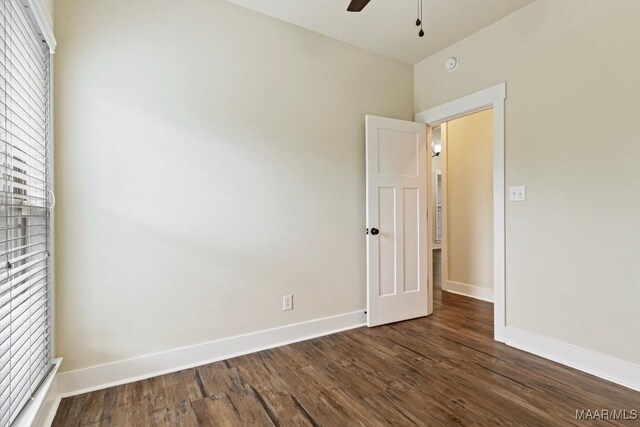 12 Crescent Ridge Ct, Deatsville, AL 36022 - spare room featuring ceiling fan, dark wood-type flooring, and a smoke detector