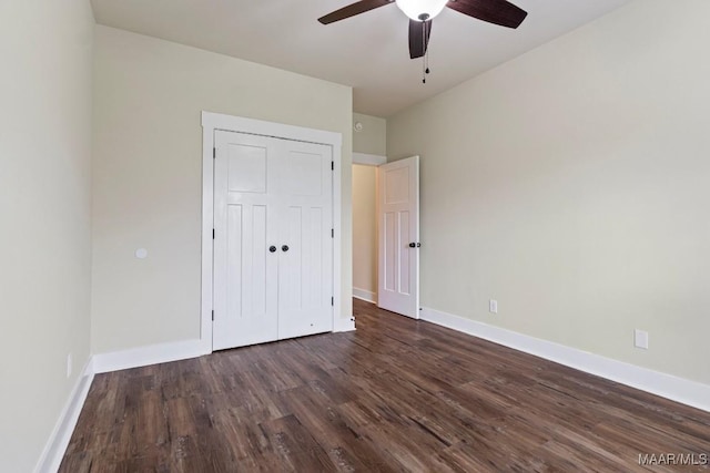12 Crescent Ridge Ct, Deatsville, AL 36022 - unfurnished bedroom with dark wood-type flooring, a closet, and a ceiling fan