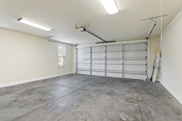 12 Crescent Ridge Ct, Deatsville, AL 36022 - garage with a garage door opener and baseboards