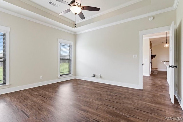 12 Crescent Ridge Ct, Deatsville, AL 36022 - unfurnished room featuring a tray ceiling, crown molding, a ceiling fan, dark wood finished floors, and a smoke detector