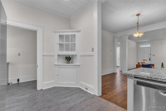 844 E Edgemont Ave, Montgomery, AL 36111 - kitchen with dishwasher, dark wood-type flooring, decorative columns, light stone counters, and crown molding