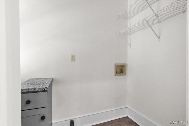 844 E Edgemont Ave, Montgomery, AL 36111 - washroom featuring hookup for a washing machine and dark wood-style flooring