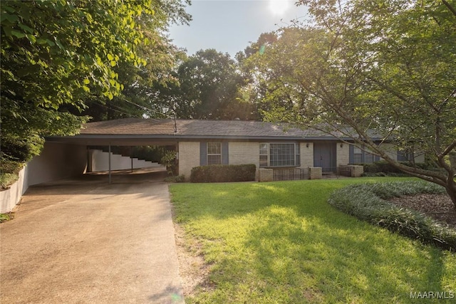 3748 Jasmine Hill Rd, Wetumpka, AL 36093 - single story home featuring concrete driveway, an attached carport, a front lawn, brick siding, and a shingled roof
