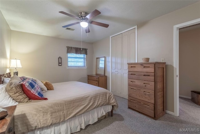 3748 Jasmine Hill Rd, Wetumpka, AL 36093 - bedroom with light carpet, a closet, and ceiling fan