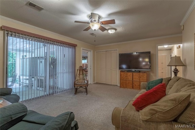 3748 Jasmine Hill Rd, Wetumpka, AL 36093 - carpeted living area featuring a ceiling fan and ornamental molding