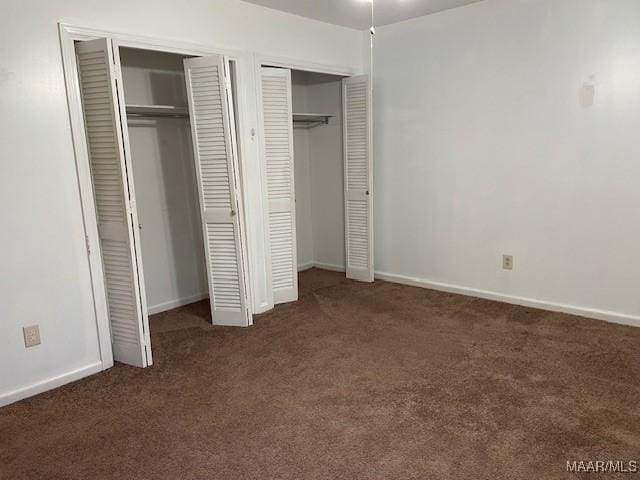 2300 Wentworth Dr, Montgomery, AL 36106 - unfurnished bedroom featuring two closets and carpet