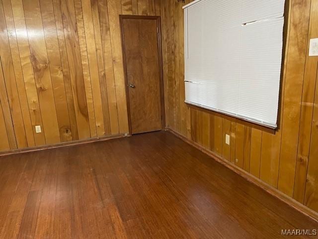 2300 Wentworth Dr, Montgomery, AL 36106 - unfurnished room with hardwood / wood-style flooring and wooden walls