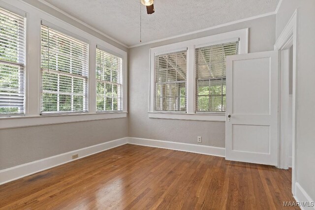 102 Vonora Ave, Montgomery, AL 36107 - unfurnished room featuring wood finished floors, a ceiling fan, a textured ceiling, and ornamental molding