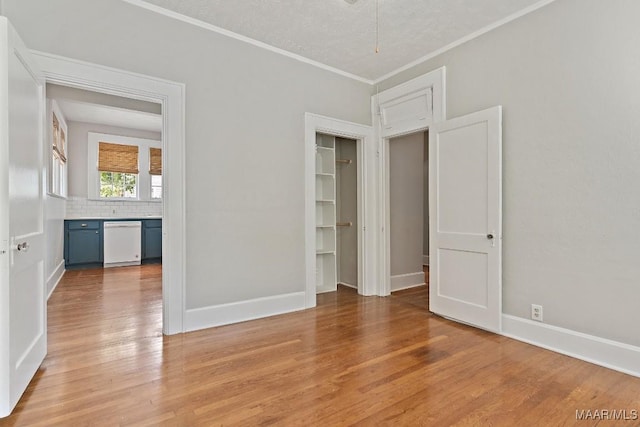 102 Vonora Ave, Montgomery, AL 36107 - spare room featuring light wood finished floors and ornamental molding