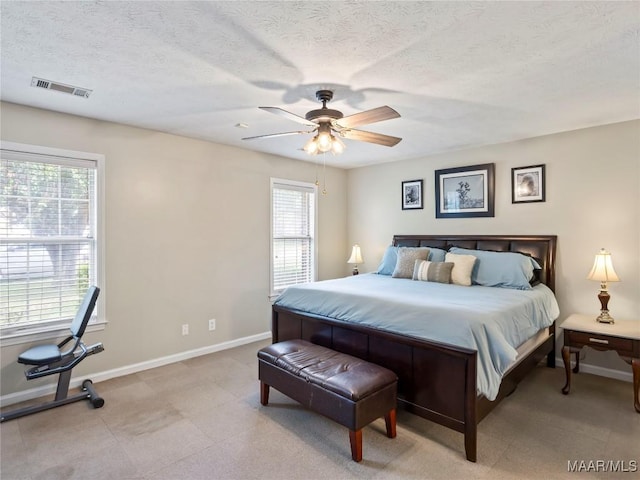 7117 Stamford Ct, Montgomery, AL 36117 - bedroom featuring a textured ceiling and a ceiling fan