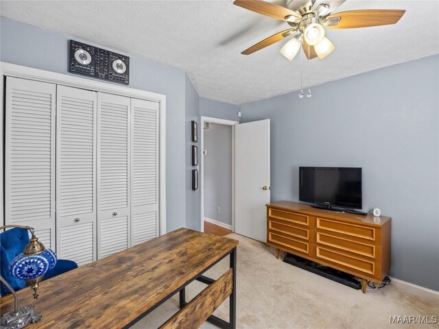 7117 Stamford Ct, Montgomery, AL 36117 - carpeted bedroom with a closet and a ceiling fan