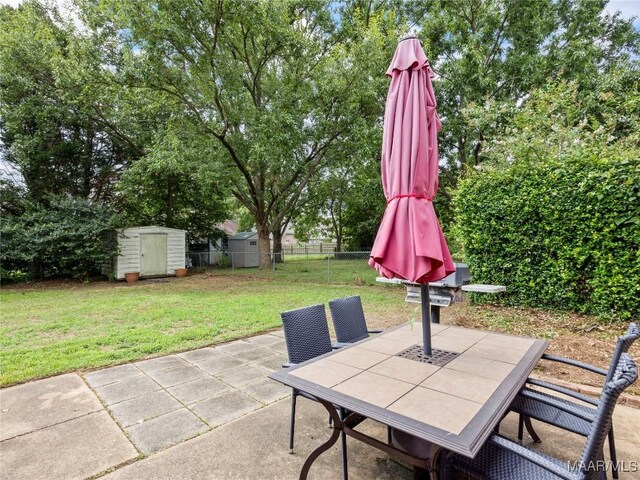 7117 Stamford Ct, Montgomery, AL 36117 - view of patio / terrace with a shed and outdoor dining area