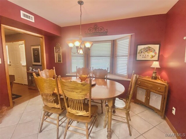 5240 Airport Rd, Millbrook, AL 36054 - dining room featuring a chandelier and light tile patterned floors