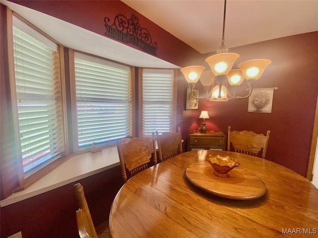 5240 Airport Rd, Millbrook, AL 36054 - dining room with a chandelier