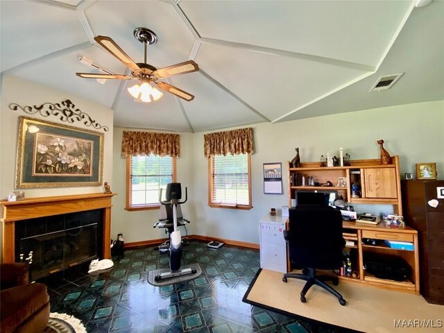 5240 Airport Rd, Millbrook, AL 36054 - office area featuring ceiling fan, lofted ceiling, a tiled fireplace, and tile patterned floors