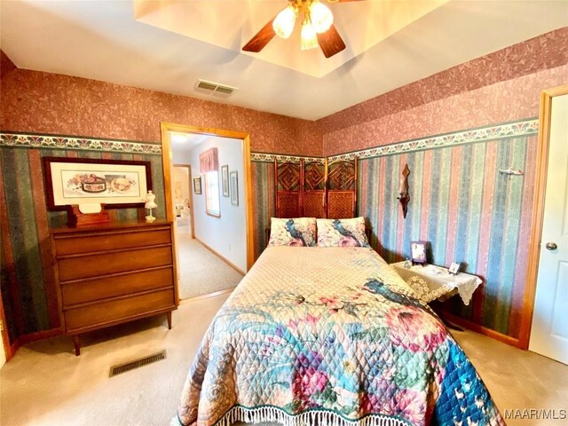 5240 Airport Rd, Millbrook, AL 36054 - carpeted bedroom featuring ceiling fan and wallpapered walls