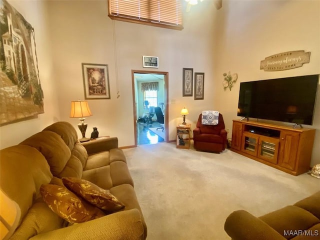 5240 Airport Rd, Millbrook, AL 36054 - living room featuring carpet floors and a towering ceiling