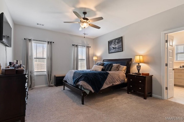 904 Hedgefield Way, Prattville, AL 36066 - bedroom with light colored carpet, multiple windows, and ensuite bath