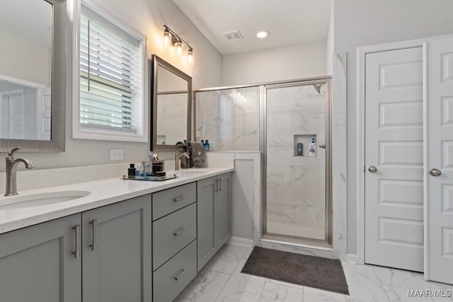 904 Hedgefield Way, Prattville, AL 36066 - full bathroom featuring marble look tiles, double vanity, and a marble finish shower