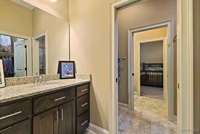 8612 Birchwood Ct, Montgomery, AL 36116 - bathroom featuring vanity and a walk in closet