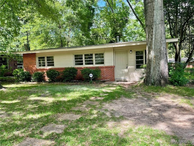 2441 Spruce Curv, Montgomery, AL 36107 - ranch-style home featuring brick siding and a front yard