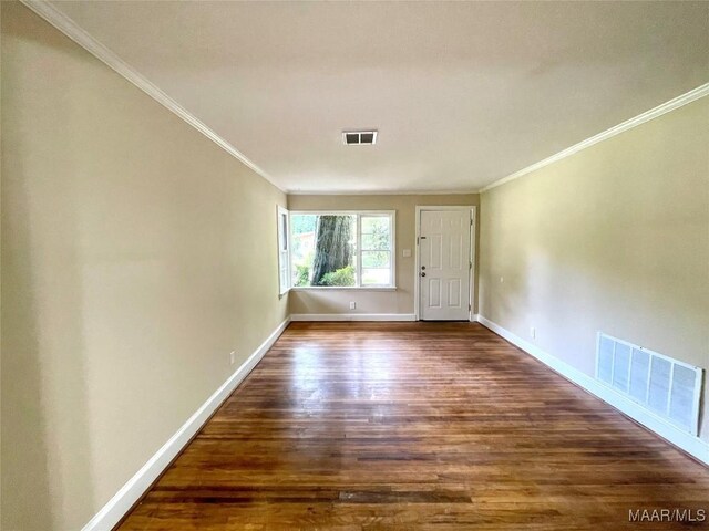 2441 Spruce Curv, Montgomery, AL 36107 - empty room with wood finished floors and crown molding