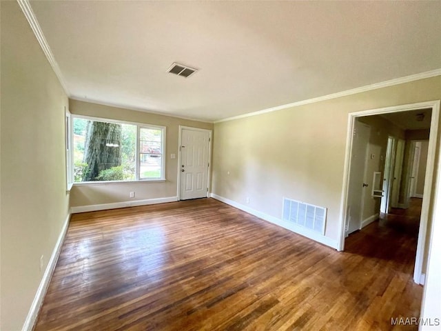 2441 Spruce Curv, Montgomery, AL 36107 - spare room featuring wood finished floors and ornamental molding