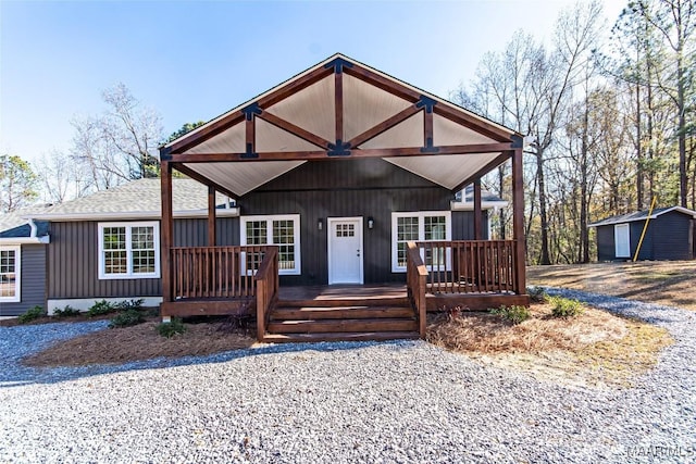11056 Central Plank Rd, Eclectic, AL 36024 - view of front facade featuring an outdoor structure and roof with shingles