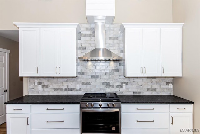 11056 Central Plank Rd, Eclectic, AL 36024 - kitchen featuring gas range, decorative backsplash, and white cabinets