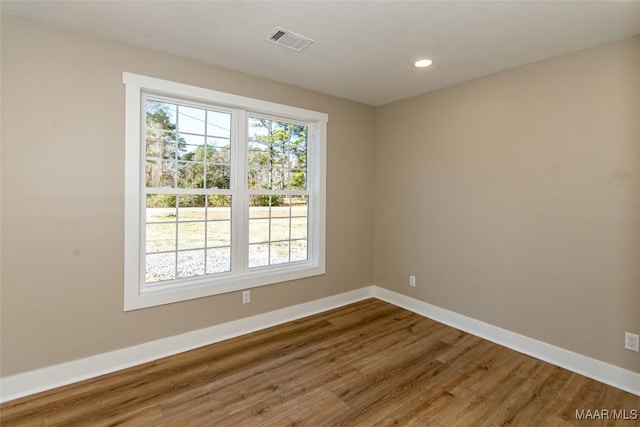 11056 Central Plank Rd, Eclectic, AL 36024 - unfurnished room featuring wood finished floors and recessed lighting