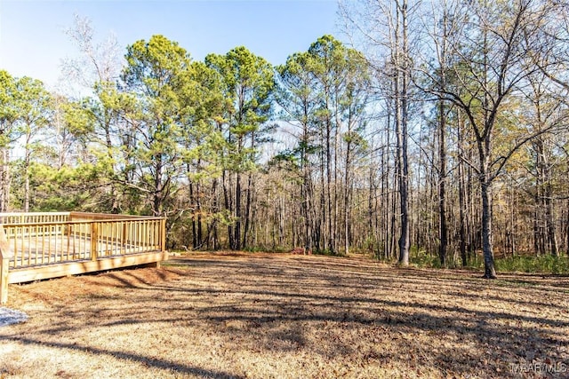 11056 Central Plank Rd, Eclectic, AL 36024 - view of yard with a deck and a forest view