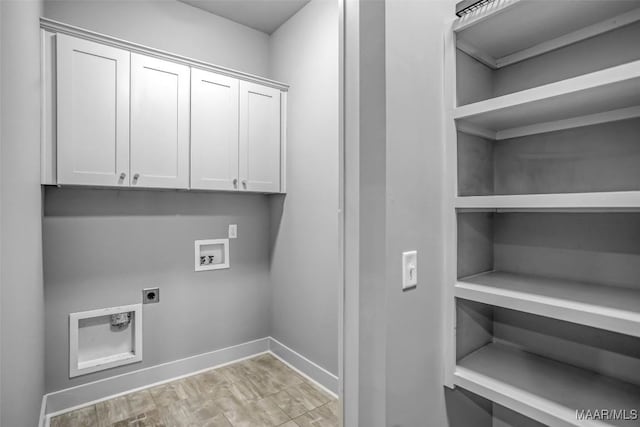 7918 Long Acre St, Montgomery, AL 36116 - laundry room with electric dryer hookup, washer hookup, and cabinet space