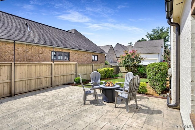 7918 Long Acre St, Montgomery, AL 36116 - fenced backyard featuring a fire pit and a patio