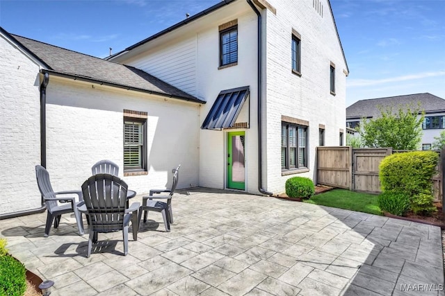 7918 Long Acre St, Montgomery, AL 36116 - rear view of property with a patio, brick siding, and stucco siding