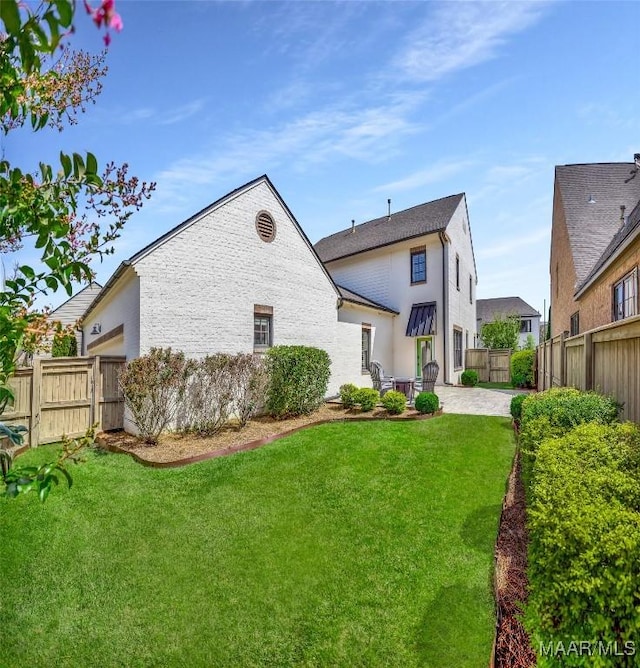 7918 Long Acre St, Montgomery, AL 36116 - rear view of property featuring a patio area and a fenced backyard