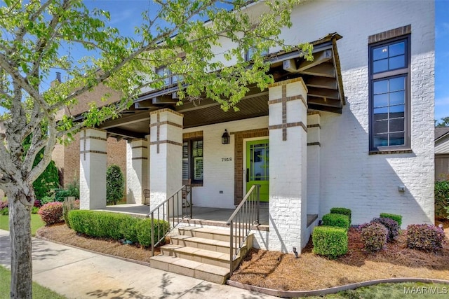 7918 Long Acre St, Montgomery, AL 36116 - view of front of house featuring a porch and brick siding